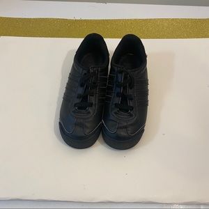 Kids black sneakers